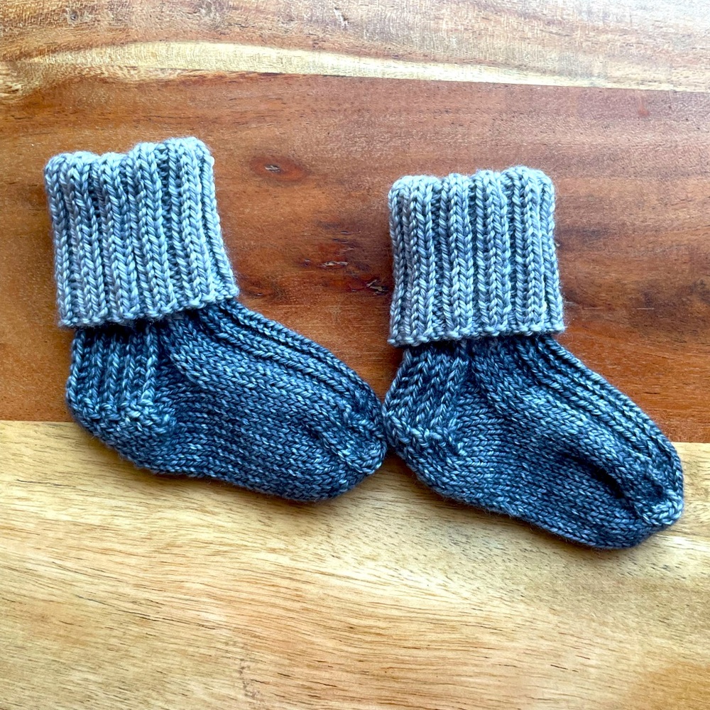 SOLD! Hand knit Baby Socks—that will actually stay on your baby’s feet!
